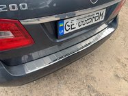 Mercedes E-class W212 2009–2016 Nerezová lišta na zadný nárazník Carmos (SW) fotografia 1