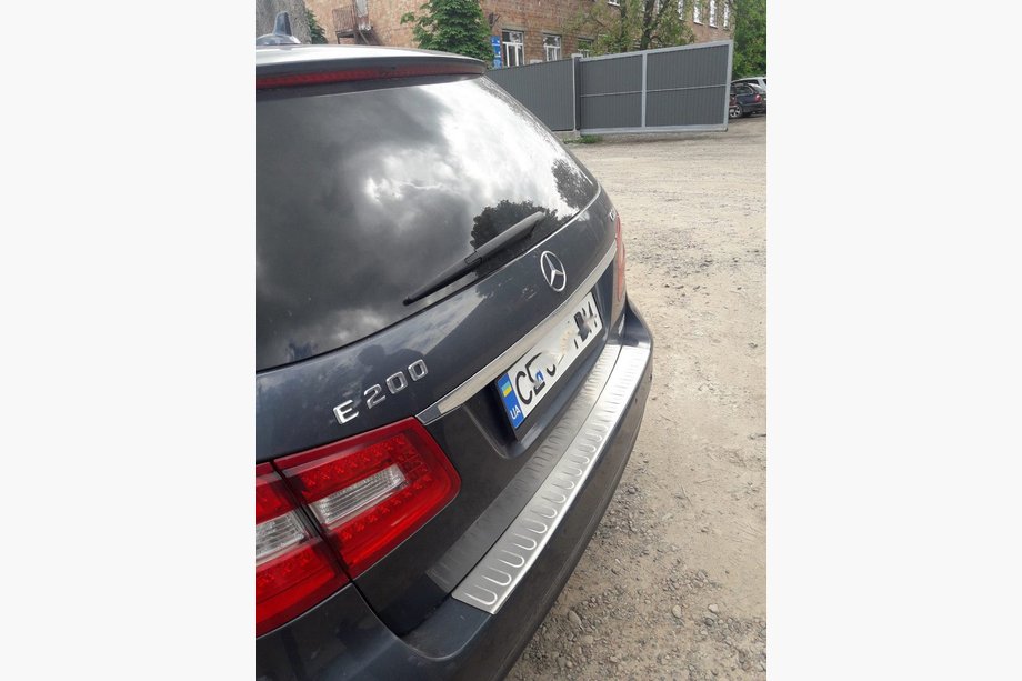 Mercedes E-class W212 2009–2016 Ochranná lišta zadného nárazníka OmsaLine (2009-2013, SW, nerez) Image