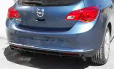 Opel Astra J 2009–2015 Kryt zadného difúzora (na lakovanie) fotografia 1