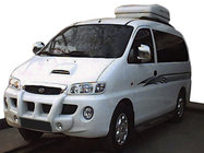 Hyundai H200, H1, Starex 1998–2007 Stredová lišta nárazníka s výrezmi pre hmlovky (na lakovanie) fotografia 1