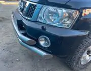 Nissan Patrol Y61 1997–2011 Predný nárazník kompletný použitý (2004-2008) fotografia 1