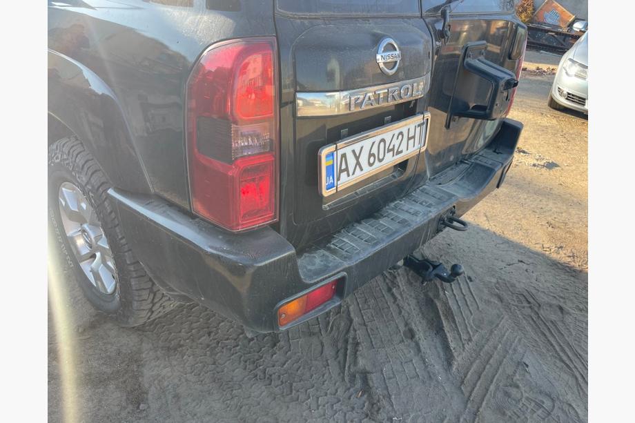 Nissan Patrol Y61 1997–2011 Zadný nárazník kompletný použitý (2004-2008) Image