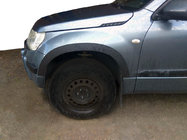 Suzuki Grand Vitara 2005–2017 Nástavce lemov blatníkov (4 ks, čierne) fotografia 1