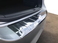 Volkswagen Passat B7 2012–2015 Nerezová lišta na zadný nárazník Carmos (SW) fotografia 1