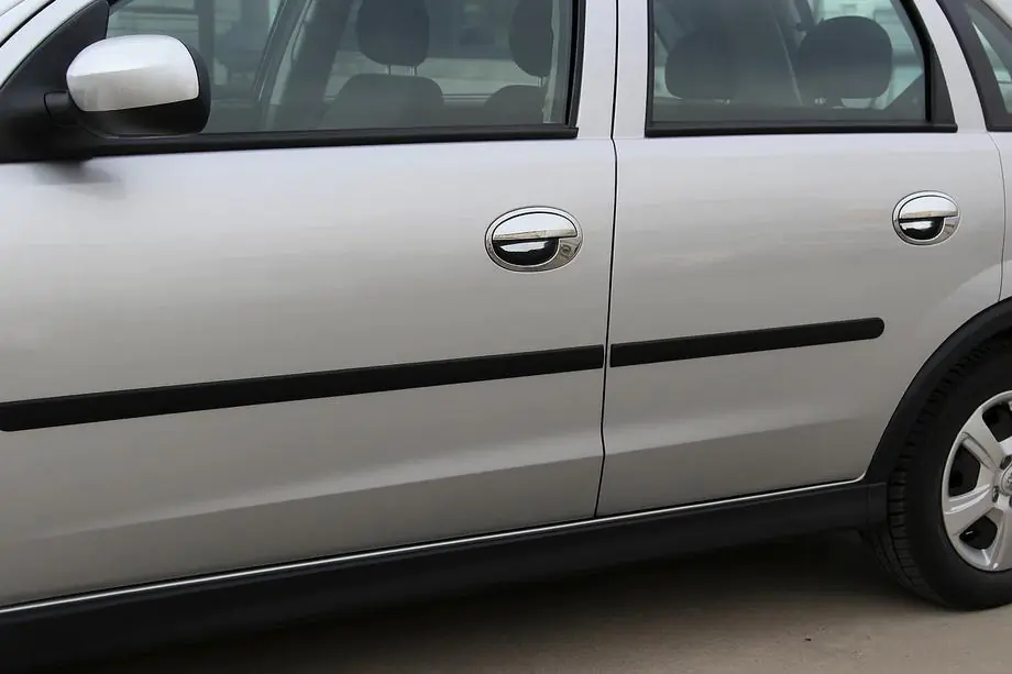 Opel Corsa C 2000–2006 Chrómové kryty kľučiek dverí (4 ks, nerez) Image