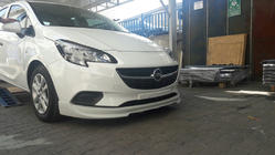 Opel Corsa E 2015–2019 Predný spodný lip spojler (na lakovanie) fotografia 1