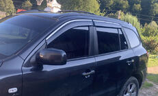 Hyundai Santa Fe 2 2006–2012 Okenné deflektory s chrómovou lištou (4 ks, Niken) fotografia 1