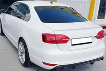 Volkswagen Jetta 2011–2018 OEM spojler (na lakovanie) fotografia 1
