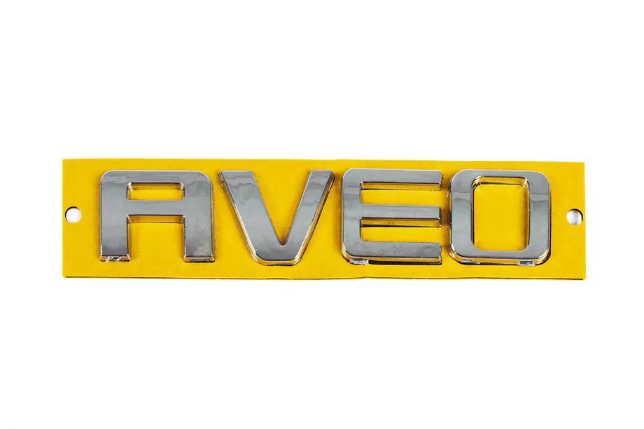 Chevrolet Aveo T250 2005–2011 Nápis AVEO 96462533 (115 mm x 23 mm) Image