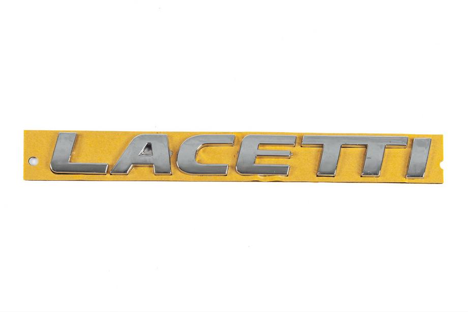 Chevrolet Lacetti 2003–2024 Nápis Lacetti 96416140 (175 mm x 20 mm) Image