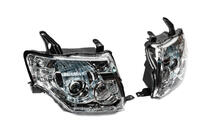 Mitsubishi Pajero Wagon IV 2006–2021 Predné svetlomety OEM (2 ks) fotografia 2