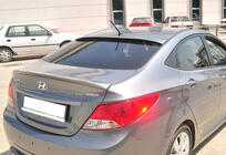 Hyundai Accent 2011–2017 Spojler DPT (lesklá čierna) fotografia 4