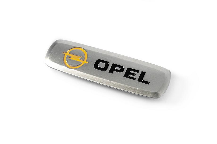 Opel Hliníkový štítok na autokoberce (1 ks) Fotografia 1