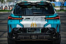 BMW XM G09 2022– Predný spodný spojler AE-Design (karbón) fotografia 17