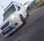 Ford Connect 2010–2013 Predný spodný lip spojler (na lakovanie) fotografia 3