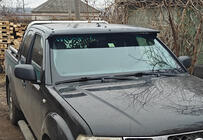 Nissan Navara 2006–2015 Slnečná clona na čelné sklo (na ráme) fotografia 1