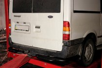 Ford Transit 2000–2014 Zadný ochranný rám so stúpadlom AK-Special Black (nerez) fotografia 1
