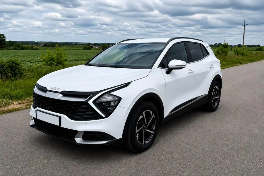 Kia Sportage 2021– Integrované strešné lyžiny, čierne OEM (ABS plast, lepená montáž) Fotografia 3