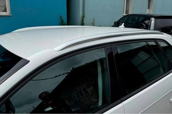 Audi A3 2012–2020: montáž strešných líšt – naše práce Fotografia 2