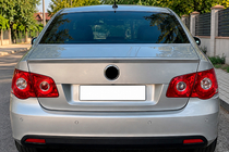 Volkswagen Jetta 2006–2011 Spojler DPT (lesklá čierna) fotografia 1