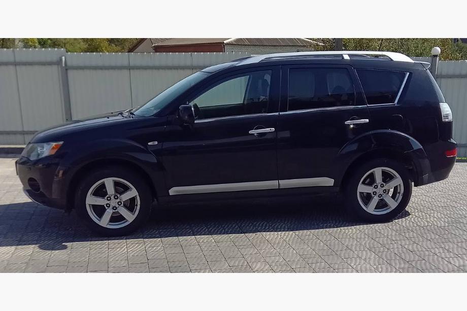 Mitsubishi Outlander 2006–2012 Okenné lišty (8 ks, nerez) Image
