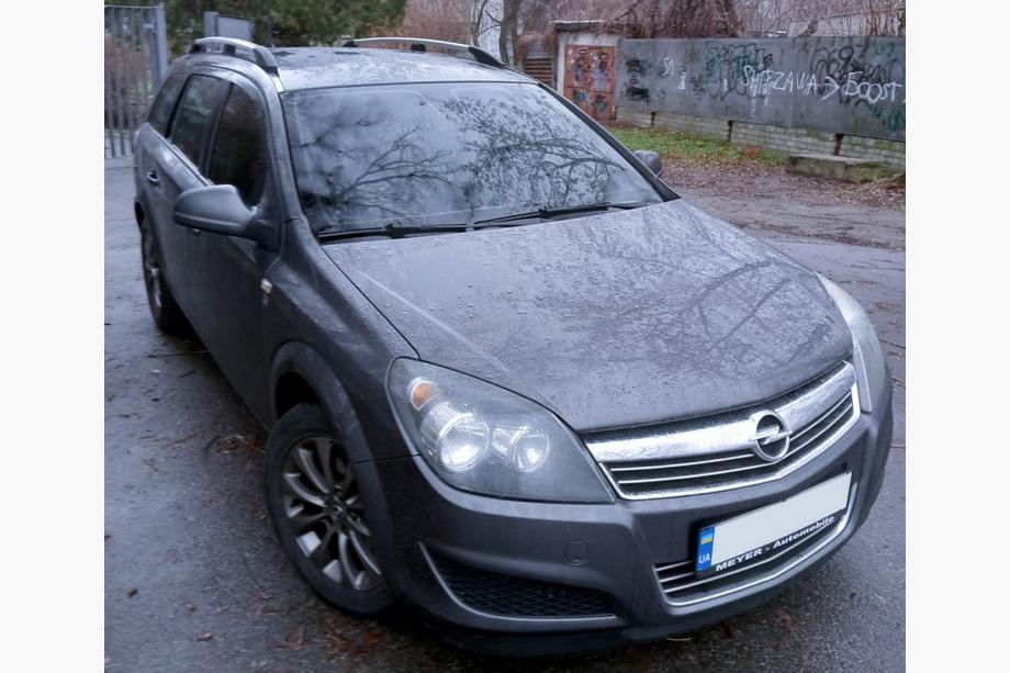 Opel Astra H 2004–2013 Hliníkové strešné lyžiny (Caravan, chróm) Image