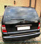 Mercedes ML W163 1997–2005 Nerezová lišta nad ŠPZ fotografia 1