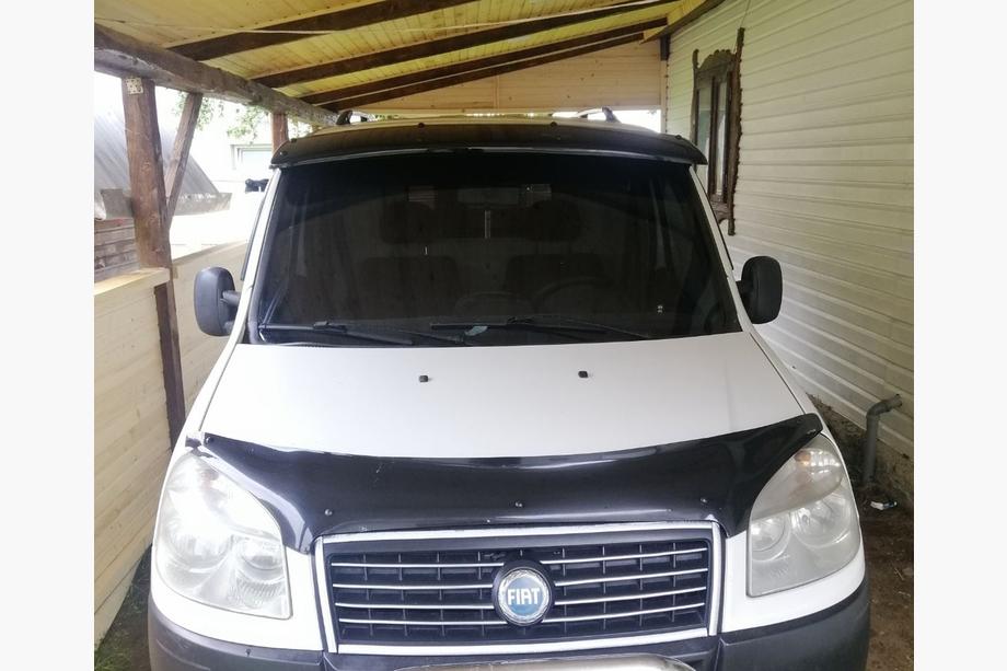 Fiat Doblo I 2005–2010 Slnečná clona na čelné sklo (čierny lesk, 5 mm) Fotografia 3
