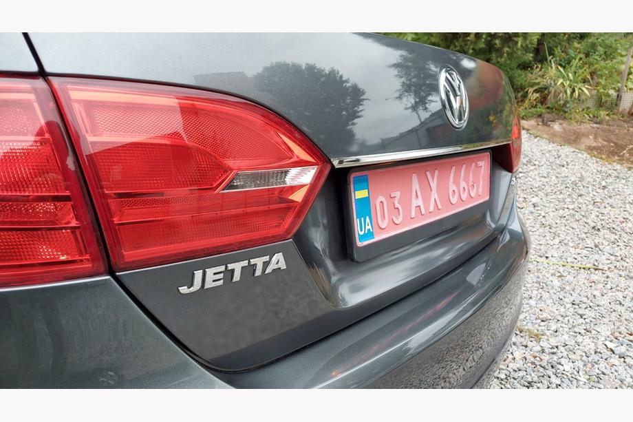 Volkswagen Jetta 2011–2018 Lišta nad ŠPZ OmsaLine (nerez) Čierny chróm Image