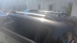 Kia Soul I 2008–2013 Chrómové strešné lyžiny (plastové pätky, montáž lepením) fotografia 1