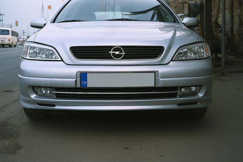 Opel Astra G Classic 1998–2012 Chrómové kryty svetlometov (2 ks, plast) Image