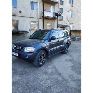 Strešné pozdĺžne nosiče (relingy) chróm, turecký dizajn (2 ks) Mitsubishi Pajero Wagon IV 2006–2021 fotografia 4