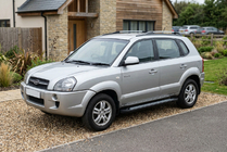 Hyundai Tucson JM 2004– Bočné nášľapy New Vision Black (2 ks, hliník) fotografia 1