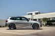 Nabitý crossover BMW X3 M s pohonom všetkých kolies fotografia 3