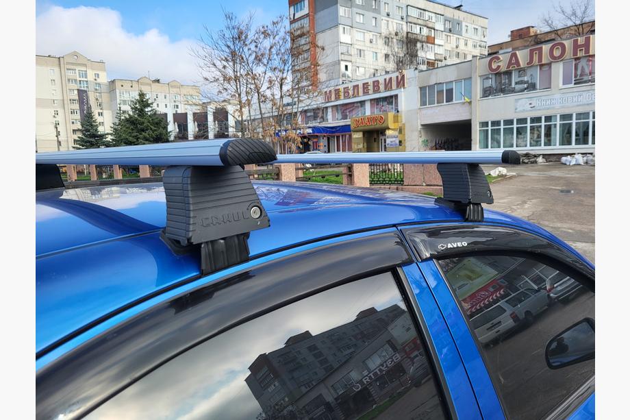 Chevrolet Aveo T250 2005–2011 Priečniky na hladkú strechu (2 ks, Asaf V4) Image
