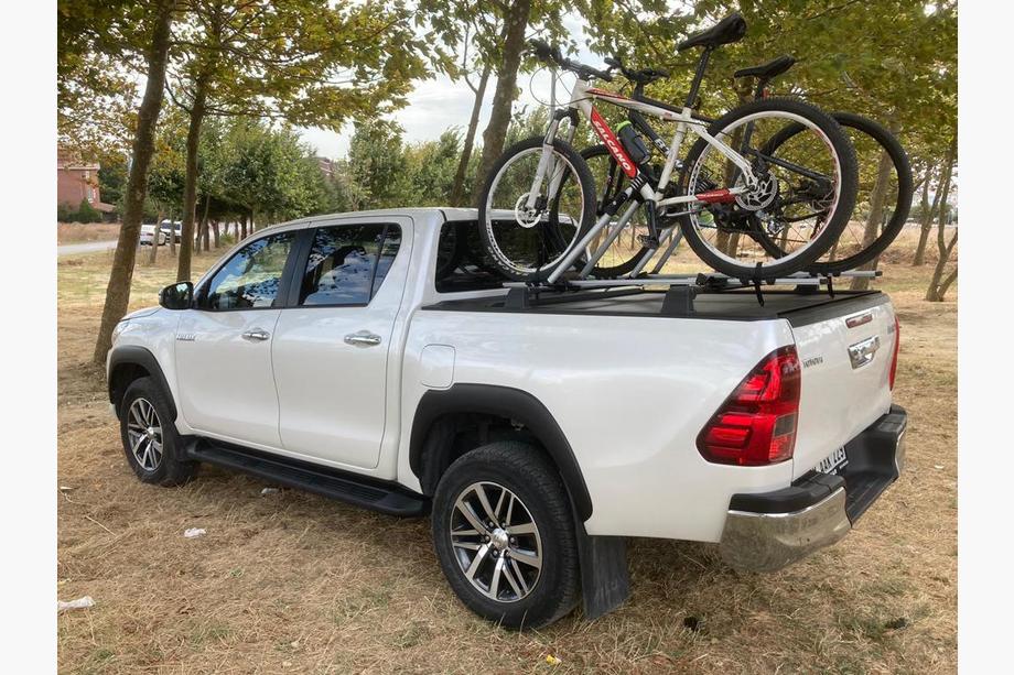 Toyota Hilux 2015– Priečniky (do originálnych upevňovacích bodov) Fotografia 3