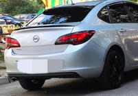 Opel Astra J 2009–2015 Lip spoiler Sedan (Sunplex, čierny) (115 cm x 5,5 cm) fotografia 1