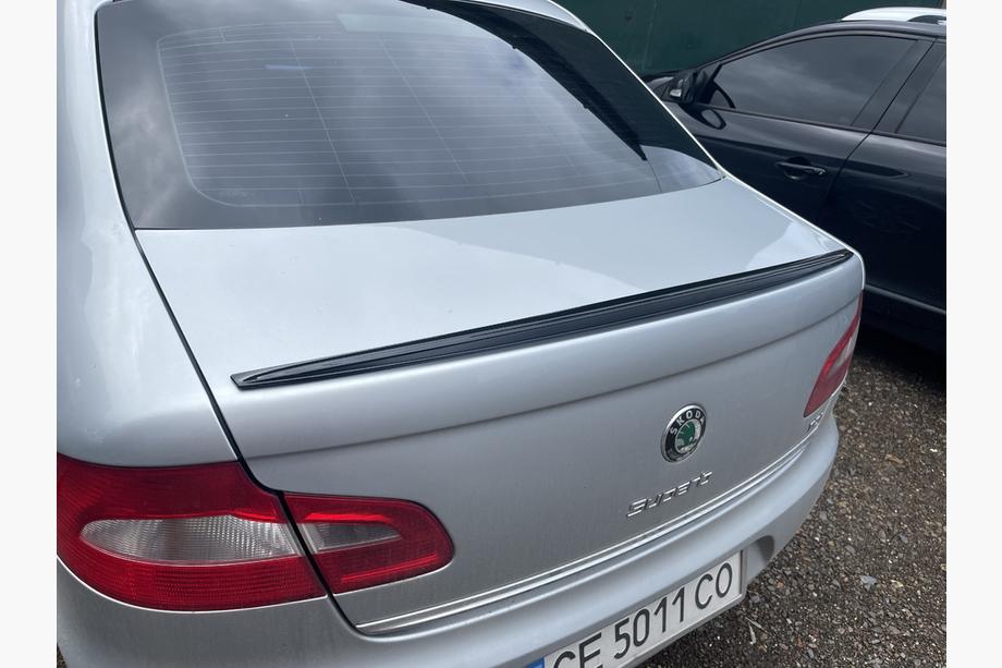 Skoda Superb 2009–2015 LIP spojler (Sunplex, čierny) (115,8 cm x 6,3 cm) Image