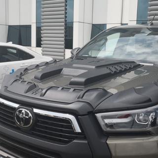 Kryt kapoty (2021+, ABS) Toyota Hilux 2015– fotografia 2