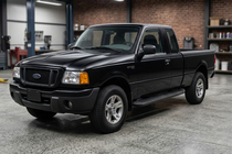 Ford Ranger 2002–2006 Bočné prahy Tayga Black (2 ks, hliník) fotografia 1